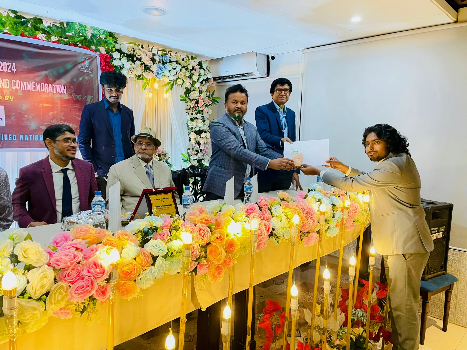 Receiving an award for my contribution as Under Secretary General of Documentation at Leading University International Model United Nations 2025.